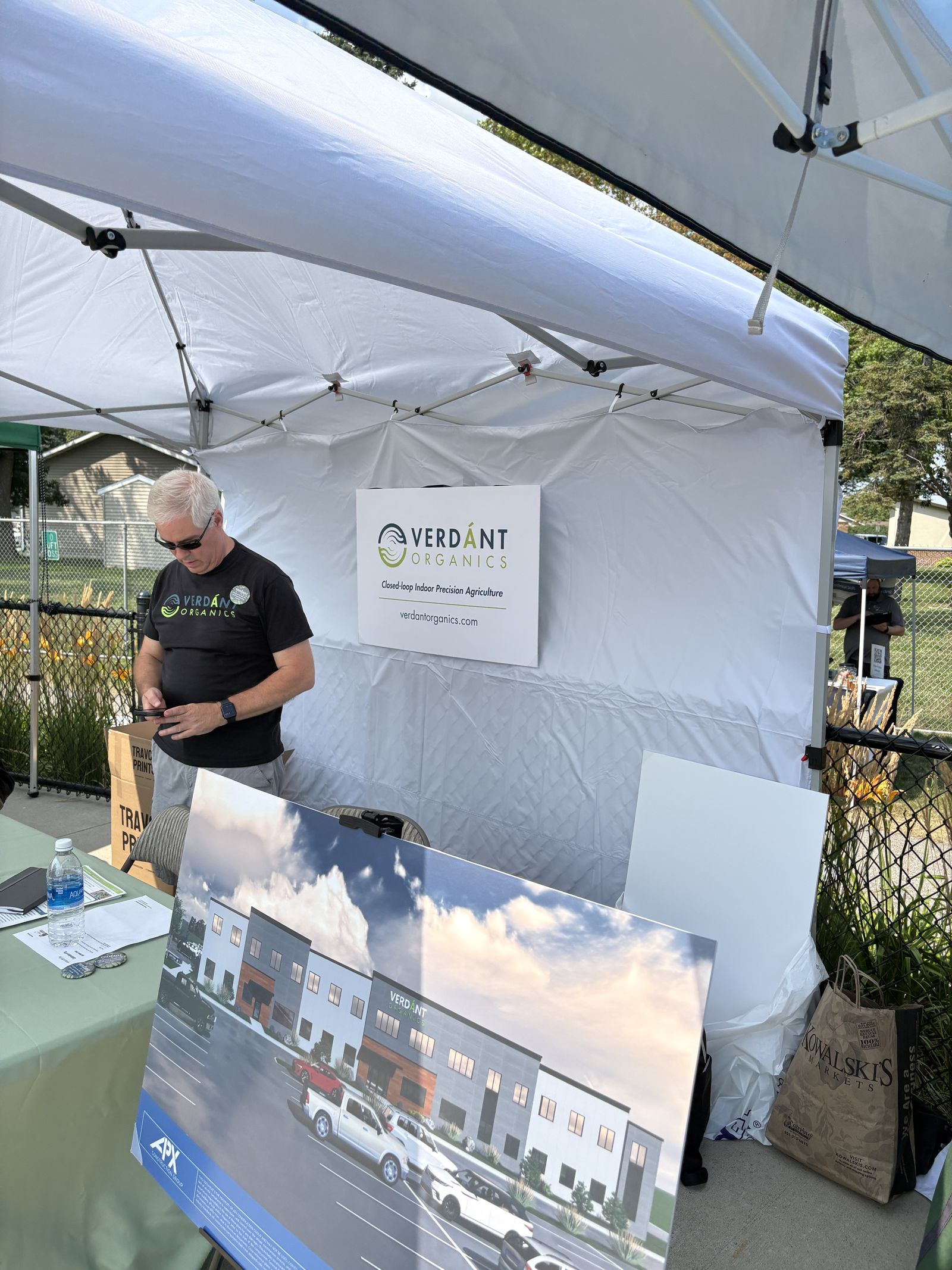 The Verdánt booth with a rendering of the new facility
