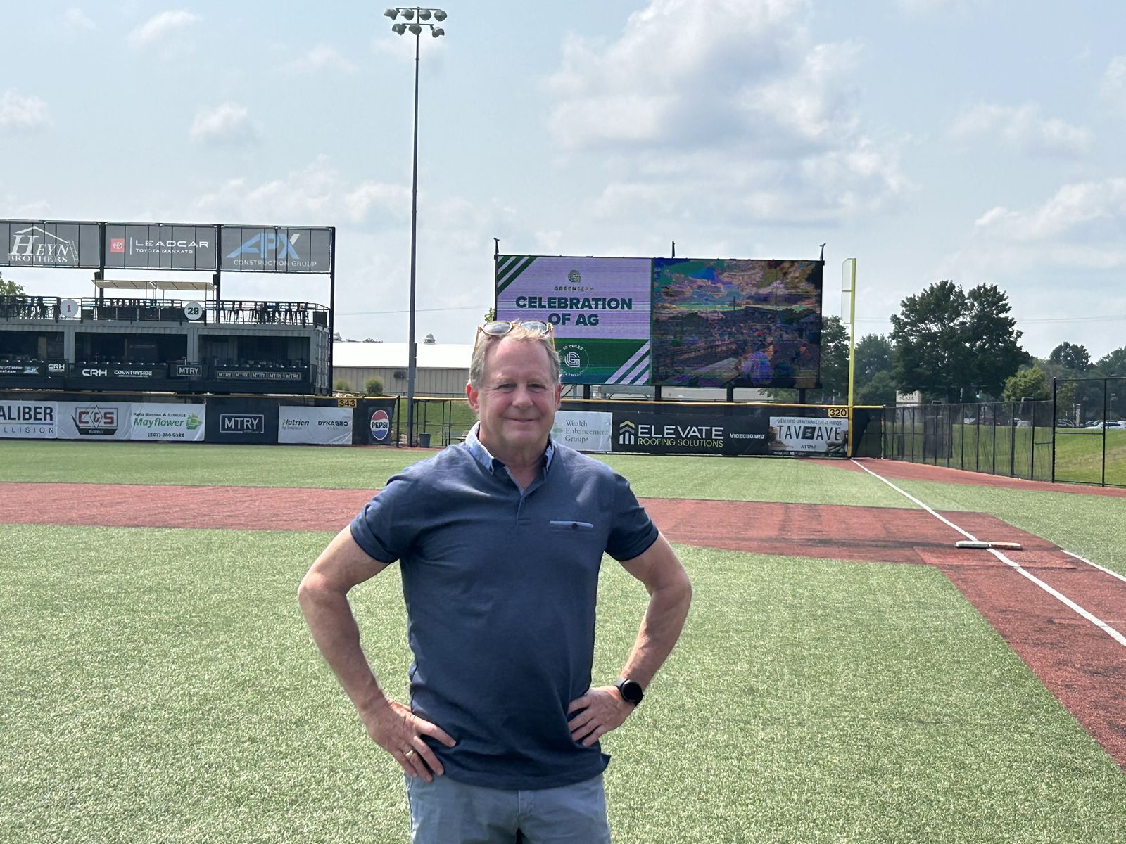 On the field beneath the Celebration of Ag videoboard